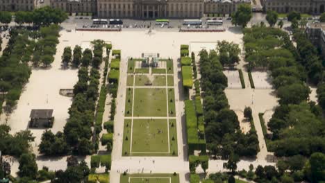 Handheld-camera-tilt-view-of-the-Champ-de-Mars-from-the-top-of-the-Eiffel-Tower-south-wing,-Paris-France