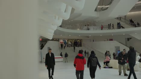 People-walking-inside-Oculus-Mall,-World-Trade-Center-Path-station,-New-York