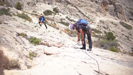 Redovan,-Spain,-May-7,-2023:-Via-ferrata-ascension-by-a-couple-sportsmen