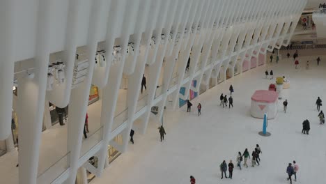 People-walking-in-Oculus-Mall,-World-Trade-Center-Transportation-Hub-,-New-York