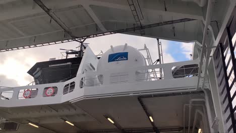 Linde-gas-tank-with-liquid-HYDROGEN-onboard-passenger-ferry-mf-HYDRA-from-Norled-company-in-Norway---Seen-from-car-deck-close-to-railings---Handheld