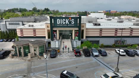 Aerial-zoom-on-Dick's-Sporting-Goods-outlet-store-in-mall-shopping-center