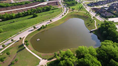 Aerial-footage-of-a-pond-in-Union-Park-in-Aubrey-Texas
