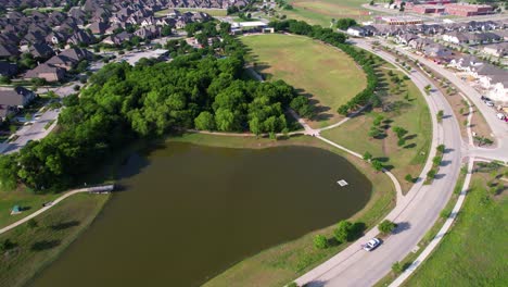 Aerial-footage-of-a-pond-in-Central-Park-at-Union-Park-in-Aubrey-Texas