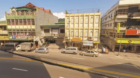 Lapso-De-Tiempo-De-Una-Carretera-Muy-Transitada-En-La-Ciudad-De-Olongapo,-Filipinas,-Durante-La-Hora-Pico