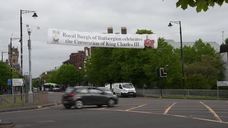 A-banner-of-King-Charles-III-at-a-busy-junction
