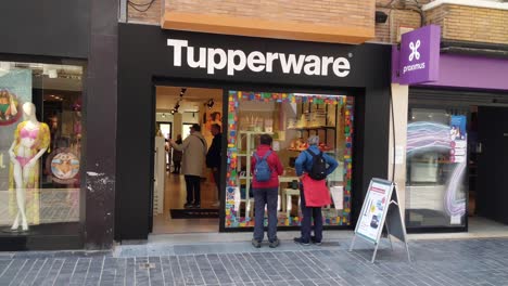 People-visiting-the-Tupperware-store-in-the-shopping-street---Oostende,-Belgium