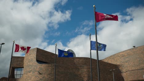 Grande-Prairie-Regional-College-GPRC-building-with-flags-low-angle
