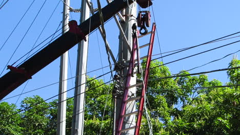 Lineman-Trying-to-Pull-the-Bolt-Cutter-with-a-Rope,-Philippines