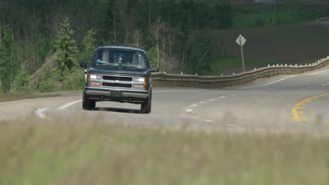 Chevy-Tahoe-drives-by-camera-near-Dunvegan-Alberta