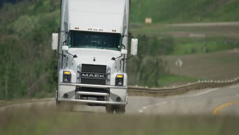 Mack-truck-speeding-down-the-highway-near-Dunvegan-Alberta