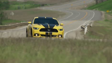 Ford-Mustang-drives-by-at-high-speed-near-Dunvegan-Alberta-on-highway