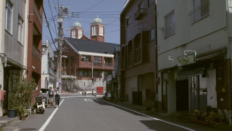 View-of-Urakami-Cathedral-from-side-street-in-Nagasaki,-Japan