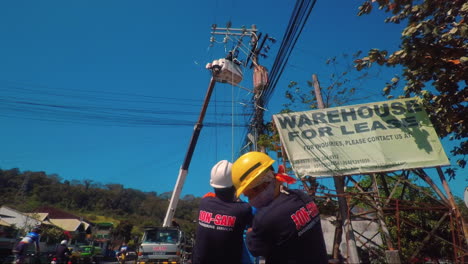 Linemen's-Teamwork-in-Installing-Transmission-Lines,-Philippines