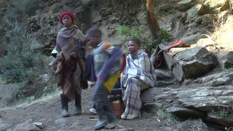 African-children-playing-music-outside,-enjoying-life-and-having-good-times