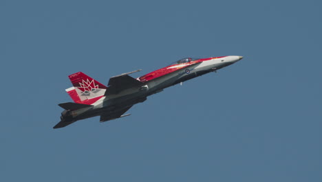 Close-up-of-a-Royal-Canadian-Air-Force-CF-18-Hornet-slowly-flying-by-in-slow-motion