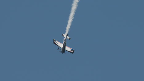 Close-up-of-F1-Rocket-or-Harmon-Rocket-II-airplane-diving-straight-down-and-turns-at-airshow-in-slow-motion