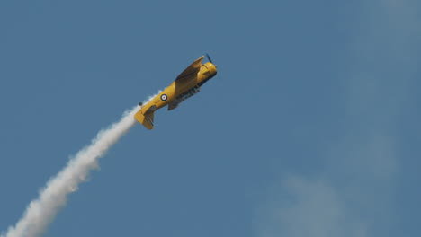 Great-close-up-of-North-American-Harvard-Mark-IV-airplane-performing-loop-at-airshow-in-slow-motion