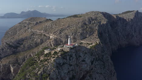 Tilt-down-dolly-shot-of-Cap-de-Formentor-lighthouse,-Mallorca