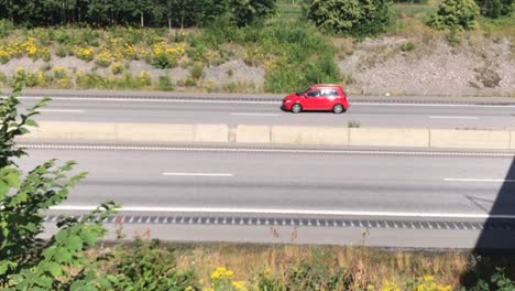 Cars-driving-on-the-highway-in-the-summer