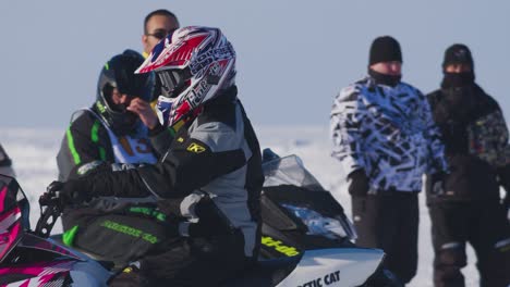 Snowmobile-racer-profile-shot-wearing-colorful-clothing-and-509-goggles