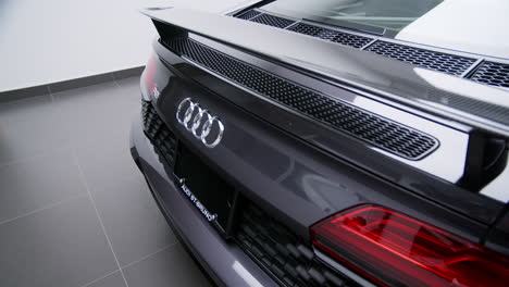 Chrome-Badge-And-Rear-Wing-Of-A-Brandnew-Audi-R8-Sports-Car