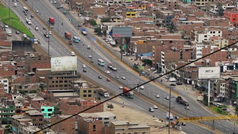 Traffic-Moving-Both-Ways-On-Highway-In-Lima,-Peru
