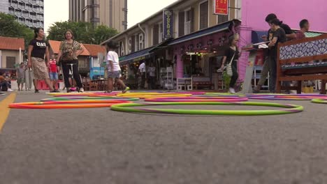 Colourful-Hula-Hoops-On-Closed-Bagdad-Street-In-Singapore