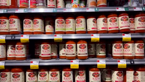 Whole-Foods-Market-Shelf-With-Rows-Of-Rao's-Bolognese-Sauce-In-Jars