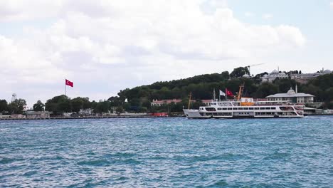 Private-cruise-liners-with-tourists,-taking-off-from-the-port-of-Istanbul