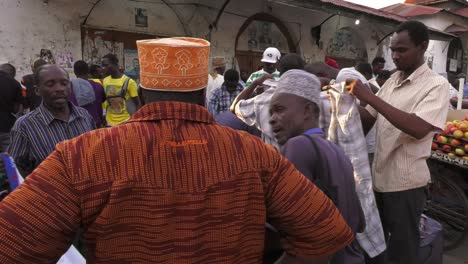 Group-Of-Adult-Male-Tanzanians-In-Outdoor-Market-In-Zanzibar