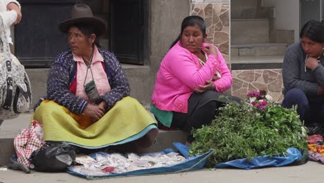 Local-Peruvian-Women-Street-Sellers-With-People-Walking-Past