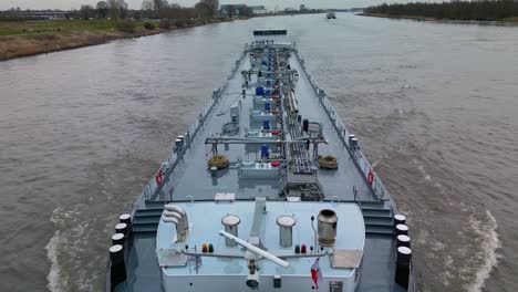 Tracking-Shot-Of-Large-Banzystad-Inland-Motor-Tank-Sailing-In-Zwijndrecht,-Netherlands