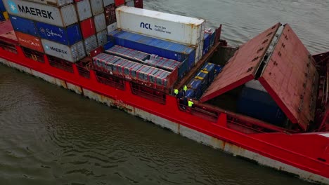 Tracking-Shot-Of-Pirita-Bulk-Containers-Carrier-Cargo-Ship-Sailing-In-Zwijndrecht,-Netherlands