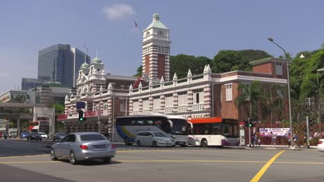 Central-Fire-Station-Viewed-Across-Hill-Street-With-Traffic-Going-Past-In-Singapore