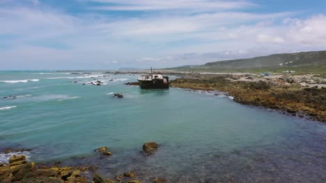 Aerial-View-Of-Meisho-Maru-Shipwreck-On-Coastline-Off-Suiderstrand