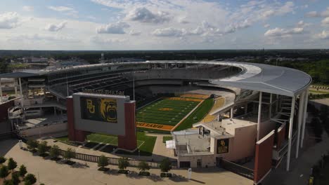 Parallax-shot-of-McLane-stadium-football-field-in-Waco-texas,-Baylor-bears
