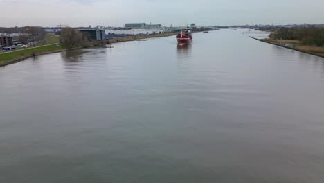 Large-Pirita-Ship-Crossing-River-In-Zwijndrecht,-Netherlands