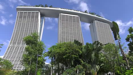 Green-Trees-In-Front-Of-Marina-Bay-Sands-Hotel-In-Singapore
