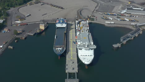 Ferries-docked-at-Port-of-Kapellskar-in-Sweden,-aerial