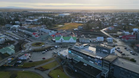 Selfoss-Town-in-Southern-Iceland,-Golden-Hour-Aerial-Cityscape