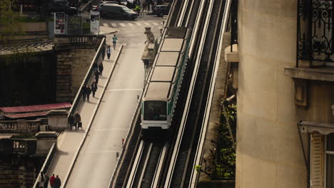 Paris-Overground-Train-on-a-City-Bridge,-Above-the-Road,-Paris,-France