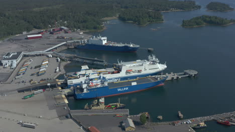 Aerial-view-of-Ferryboat-ship-made-fast-in-a-naval-port,-establishing-shot