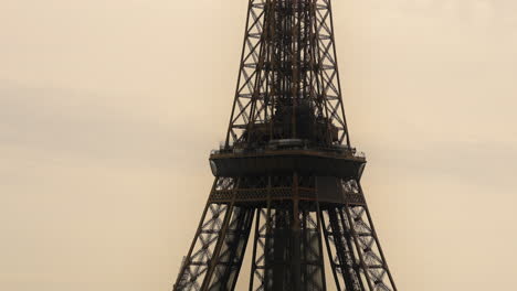 Middle-Level-of-Eiffel-Tower-in-the-City-of-Paris-on-Cloudy-Day,-Zoomed-View