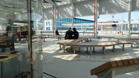 Lady-Cleaner-Pushing-Cleaning-Tools-At-The-TEC-Bus-Station-In-Belgium