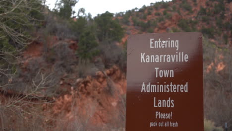 Entering-Kanarraville-Town-Administered-Lands-Sign-at-Beginning-of-Hiking-Trail,-Utah-USA,-Close-Up