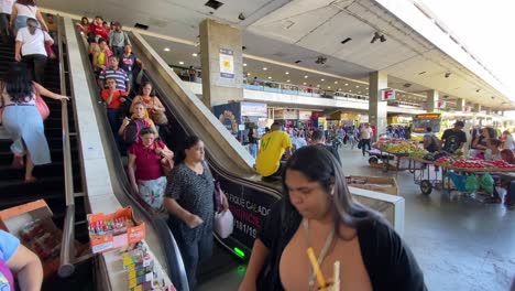 People-are-using-escalators-and-staircases-inside-a-shopping-mall