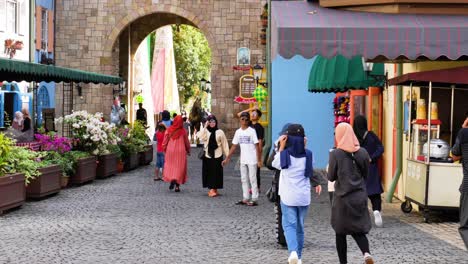 Famous-French-village-with-shops-and-restaurant-tourists-walking-around-in-holidays-at-Colmar-Tropicale,-Bukit-Tinggi-Malaysia