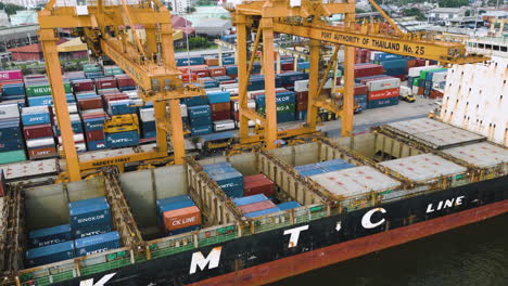 Container-Cranes-and-Ship-in-Container-Yard-Deep-Sea-Port,-Loading-Containers-on-a-Ship,-Port-Authority-of-Thailand
