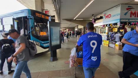 A-tourist-is-walking-around-a-bus-station